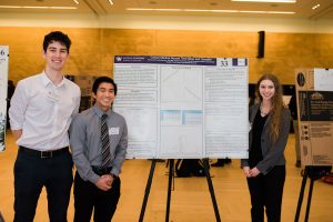 Cece Landau, Alex Kasiniak and Kevin Lau show their work on the Cancer Medical Record Time-Slicer and Classifier. 