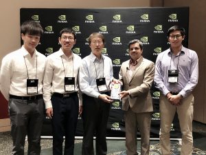 Hwang and his team, Zheng Tang, Gaoang Wang and Hao Xiao, and undergraduate student Aotian Zheng, receiving their award. 