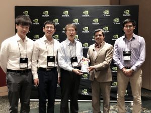 Hwang and his team, Zheng Tang, Gaoang Wang and Hao Xiao, and undergraduate student Aotian Zheng, receiving their award.
